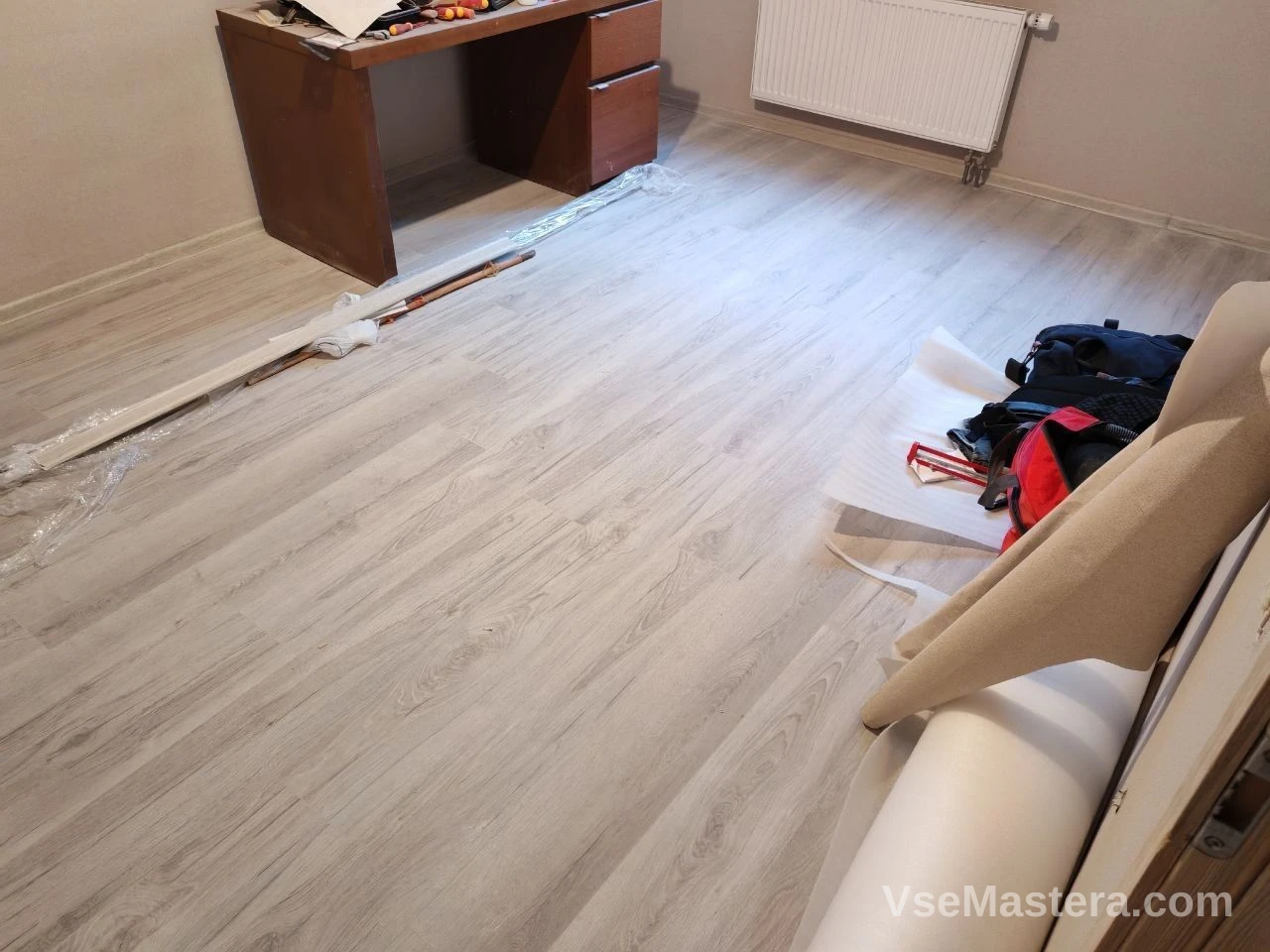 Укладка ламината в коридоре с подрезкой